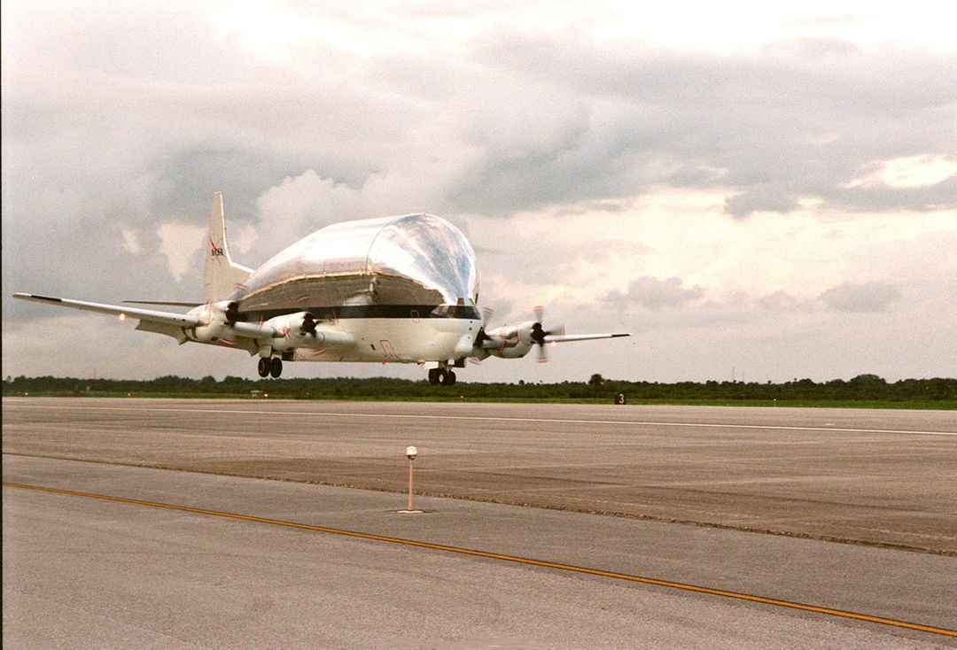 NASA Super Guppy Landing with ISS S1 Truss Segment at Kennedy Space Center - Free Images, Stock Photos and Pictures on Pikwizard.com