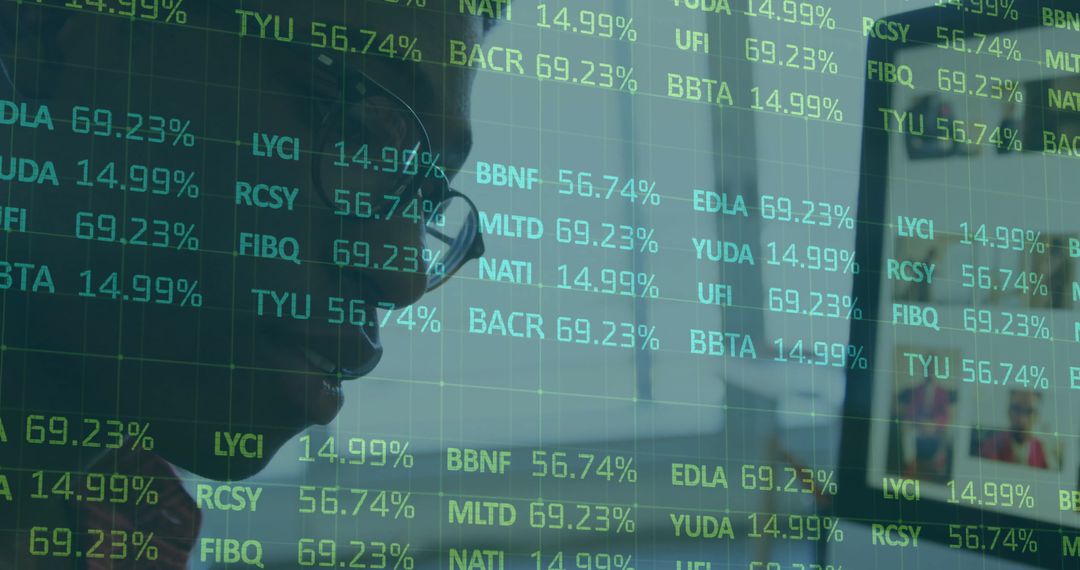 Businessman Analyzing Stock Market Data on Computer Screen