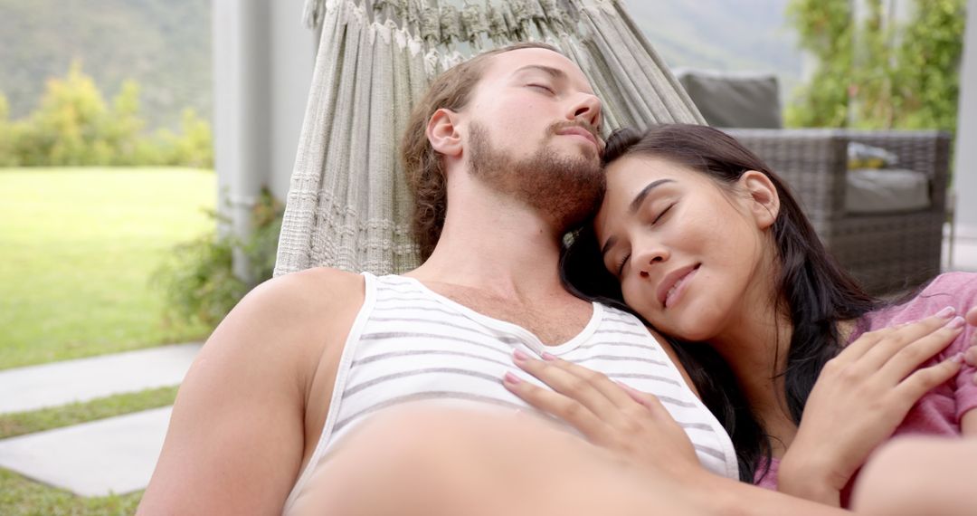 Romantic Couple Relaxing in Peaceful Backyard Hammock