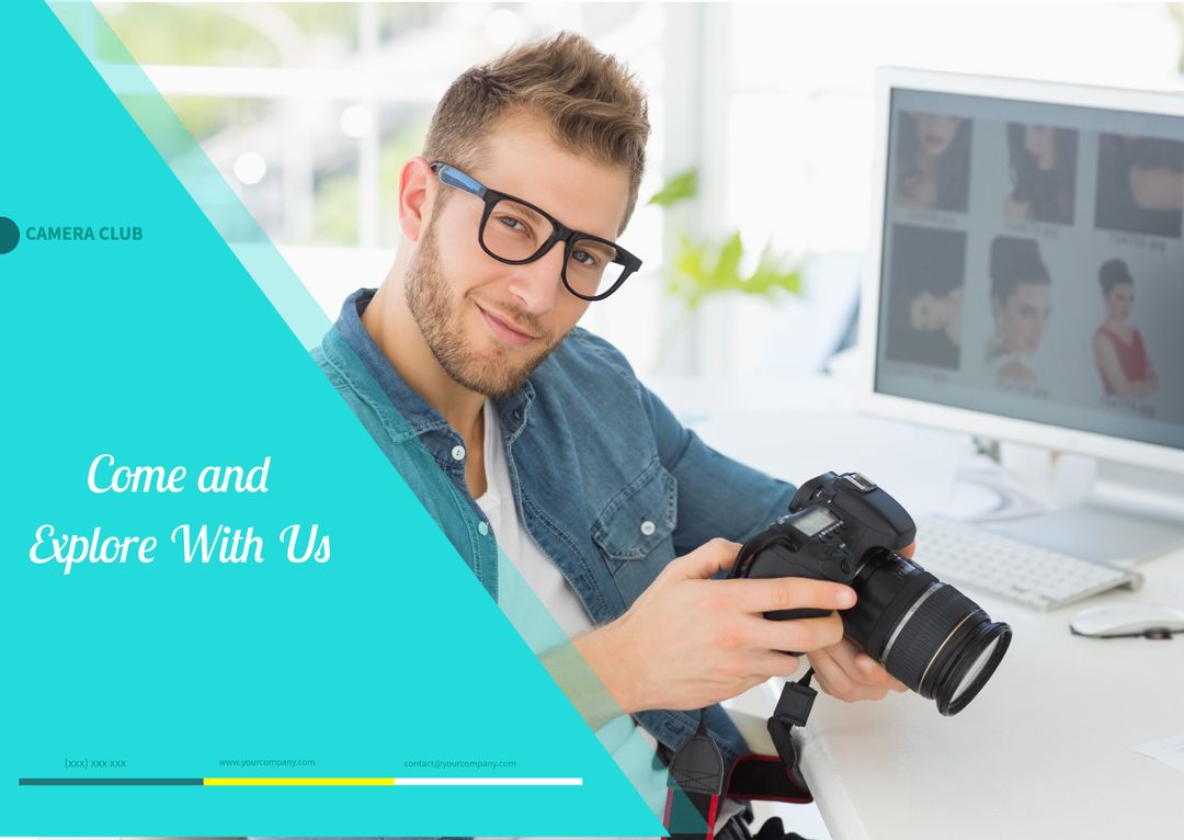 Smiling Photographer Holding DSLR in Studio Office Environment