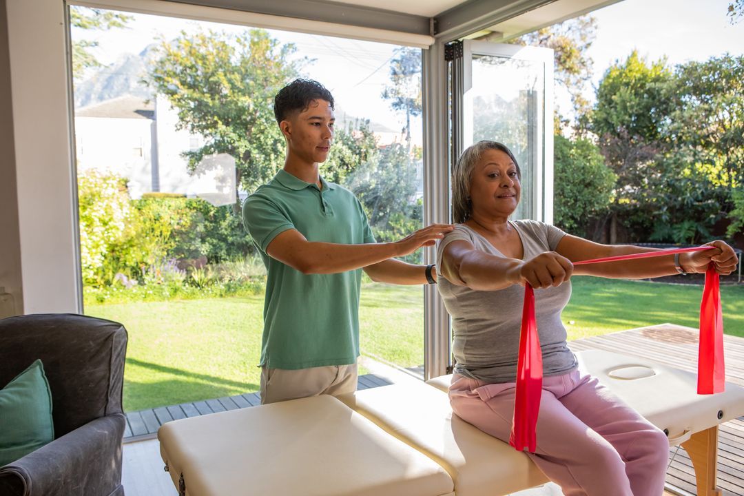 Professional Physiologist Assisting Client in Home Exercise Routine
