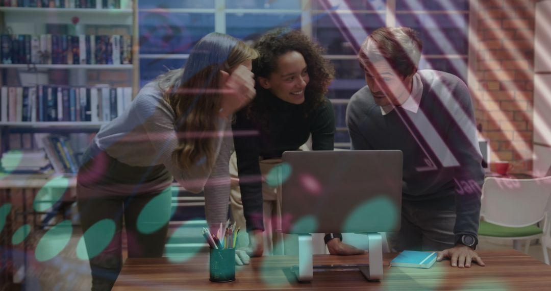 Diverse Team Collaborating Over Data in Modern Office