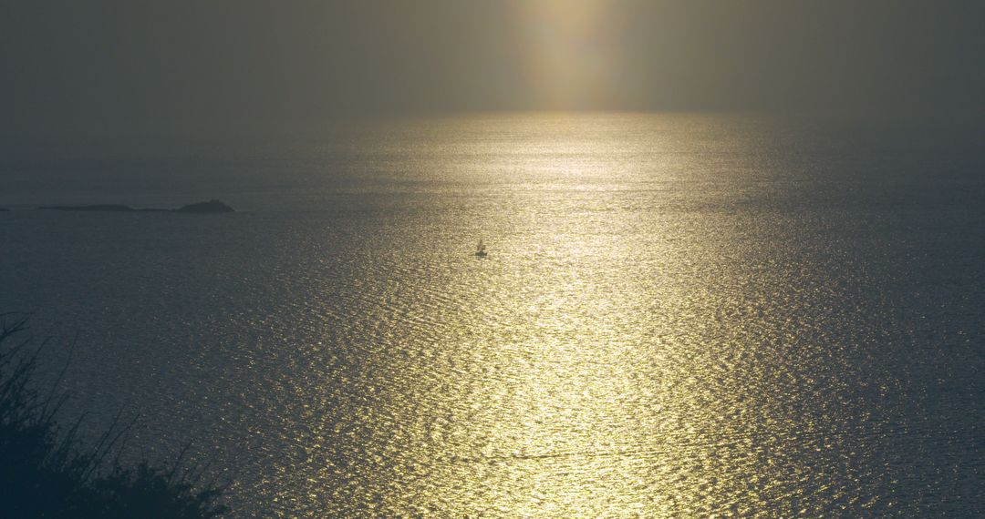 Solitary Boat in Glorious Sunset Over Calm Ocean - Free Images, Stock Photos and Pictures on Pikwizard.com