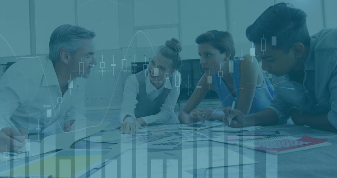 Business Team Analyzing Financial Data in Collaborative Office Meeting