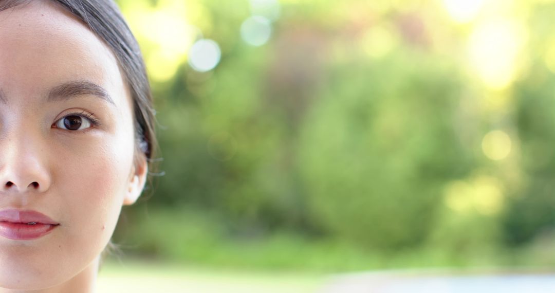 Half Portrait of Asian Woman in Tranquil Garden Setting