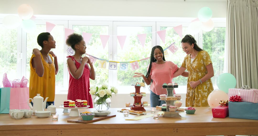 Joyful Baby Shower with Laughter and Cake Among Friends