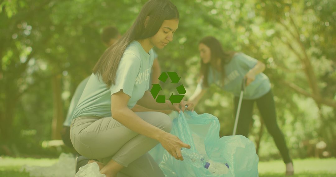 Volunteers Collecting Trash in Park for Environmental Cleanup - Free Images, Stock Photos and Pictures on Pikwizard.com