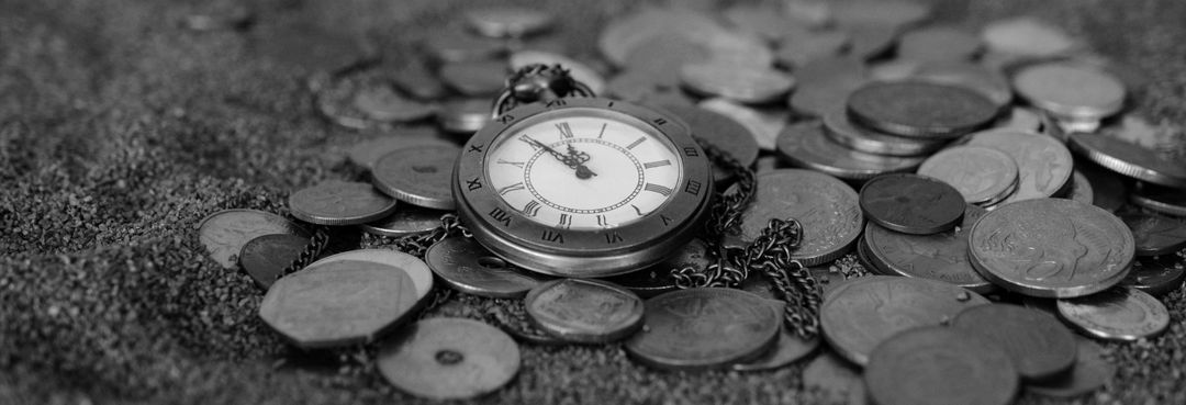 Vintage Pocket Watch on a Pile of Old Coins in Black and White - Free Images, Stock Photos and Pictures on Pikwizard.com