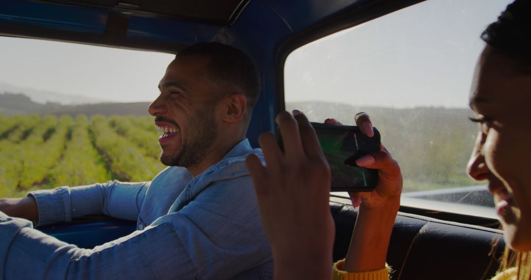 Couple Enjoying Road Trip Through Scenic Countryside - Free Images, Stock Photos and Pictures on Pikwizard.com