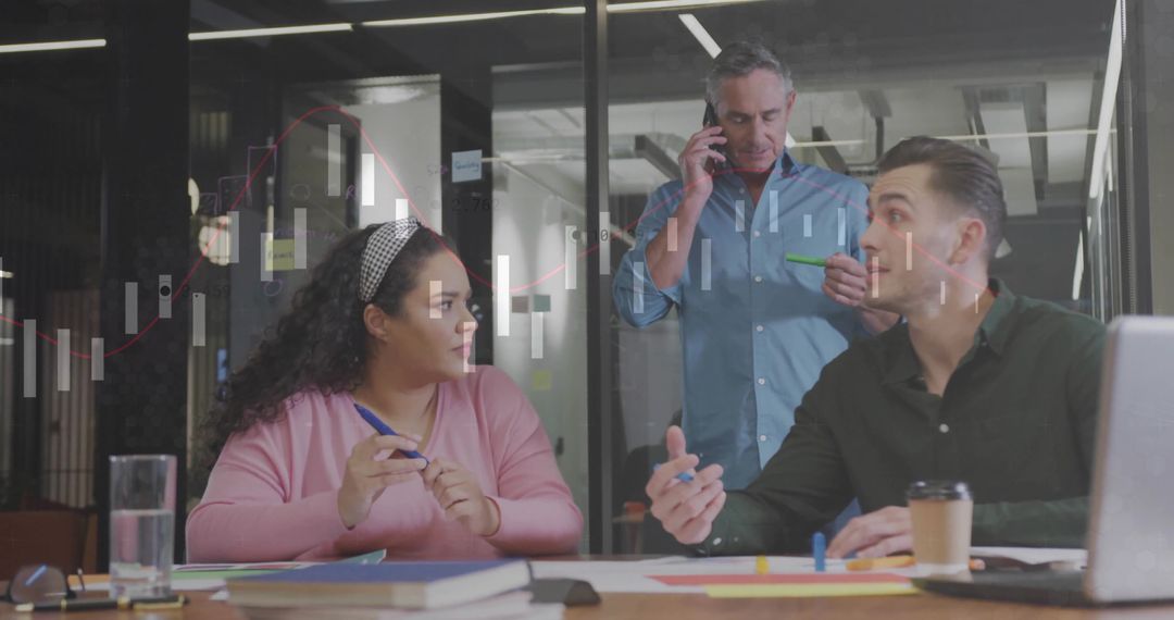 Team Collaboration in a Modern Office With Data Charts