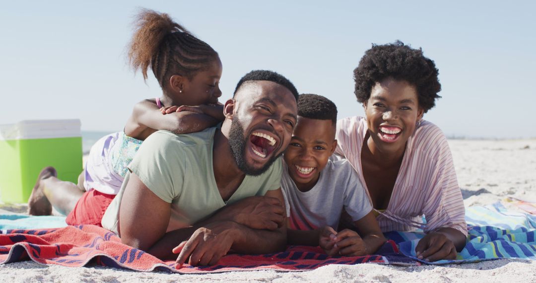 Happy African American Family Enjoying Beach Time Together - Free Images, Stock Photos and Pictures on Pikwizard.com