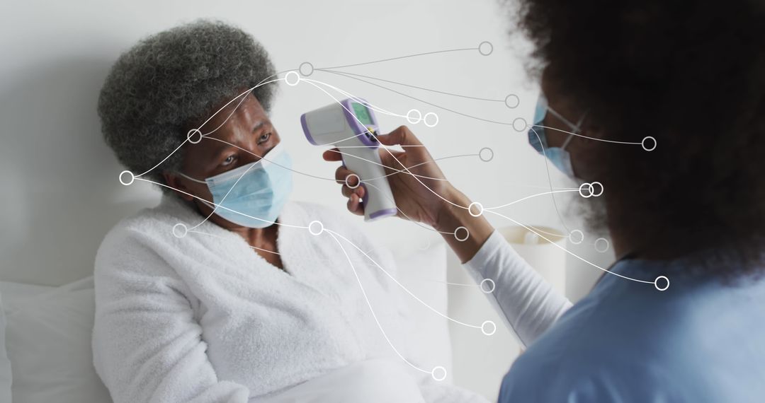 Healthcare Professional Using Infrared Thermometer on Patient