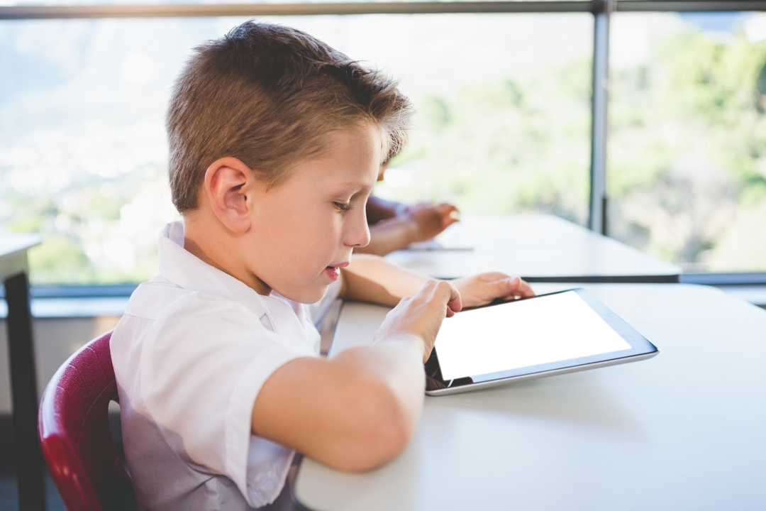 Transparent Context of Boy Using Digital Tablet in Classroom Educational Setting - Download Free Stock Images Pikwizard.com