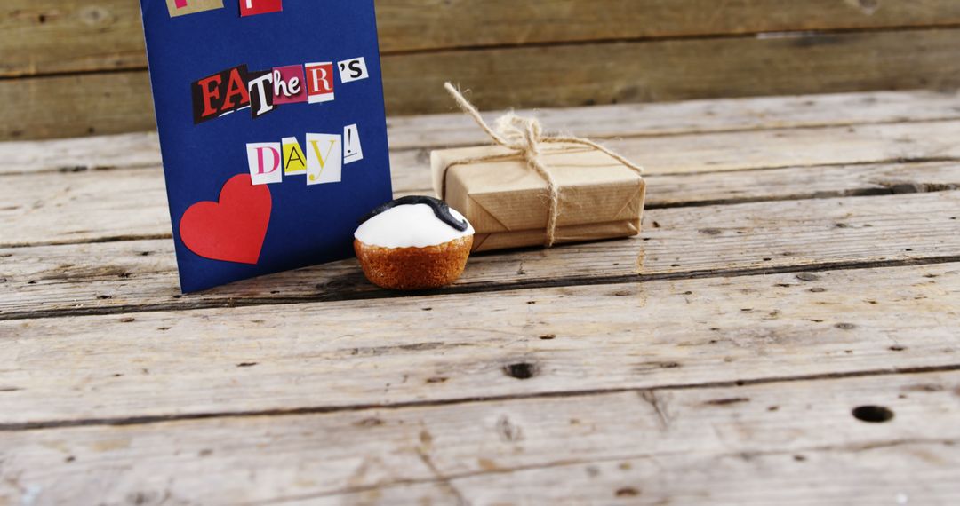 Father's Day Card with Gift Box and Mini Tart on Wooden Table - Free Images, Stock Photos and Pictures on Pikwizard.com