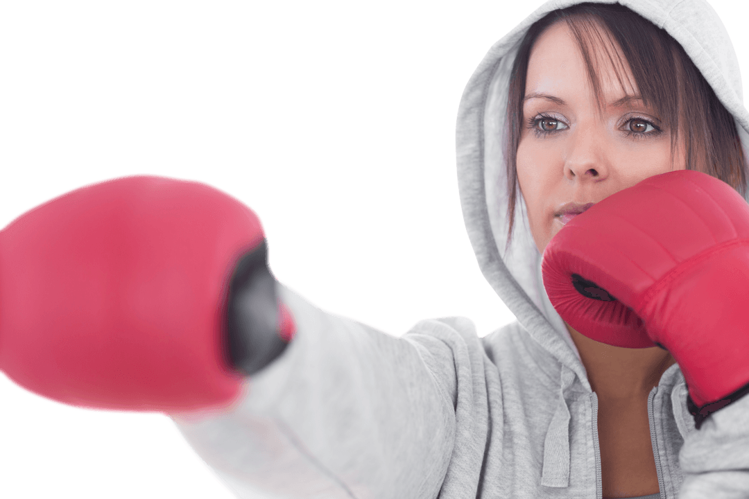 Focused Woman in Boxing Pose with Hood and Red Gloves Transparent
