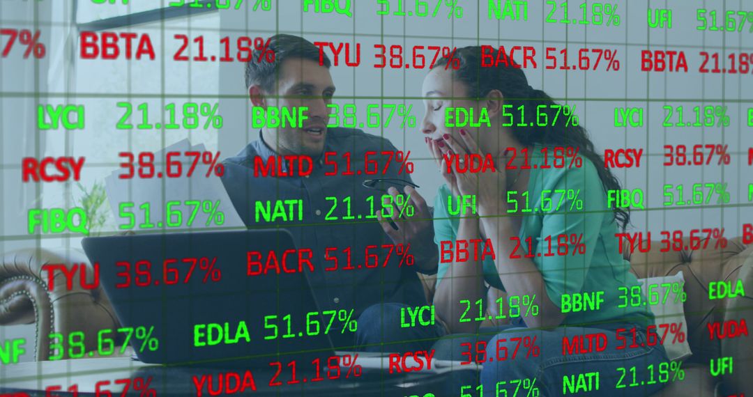 Excited Couple Reviewing Stock Market Data at Home