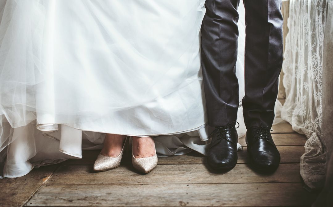 Bride and Groom Feet Close-Up on Wooden Floor - Free Images, Stock Photos and Pictures on Pikwizard.com