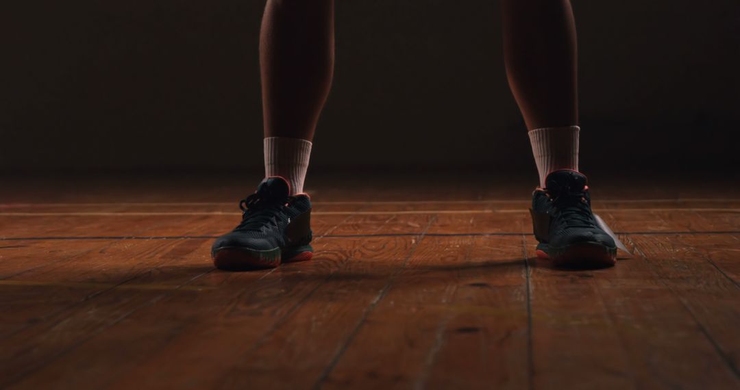 Athlete's Feet on Wooden Court Ready for Action - Free Images, Stock Photos and Pictures on Pikwizard.com