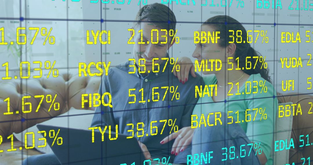 Couple Using Laptop Amid Financial Data Overlay