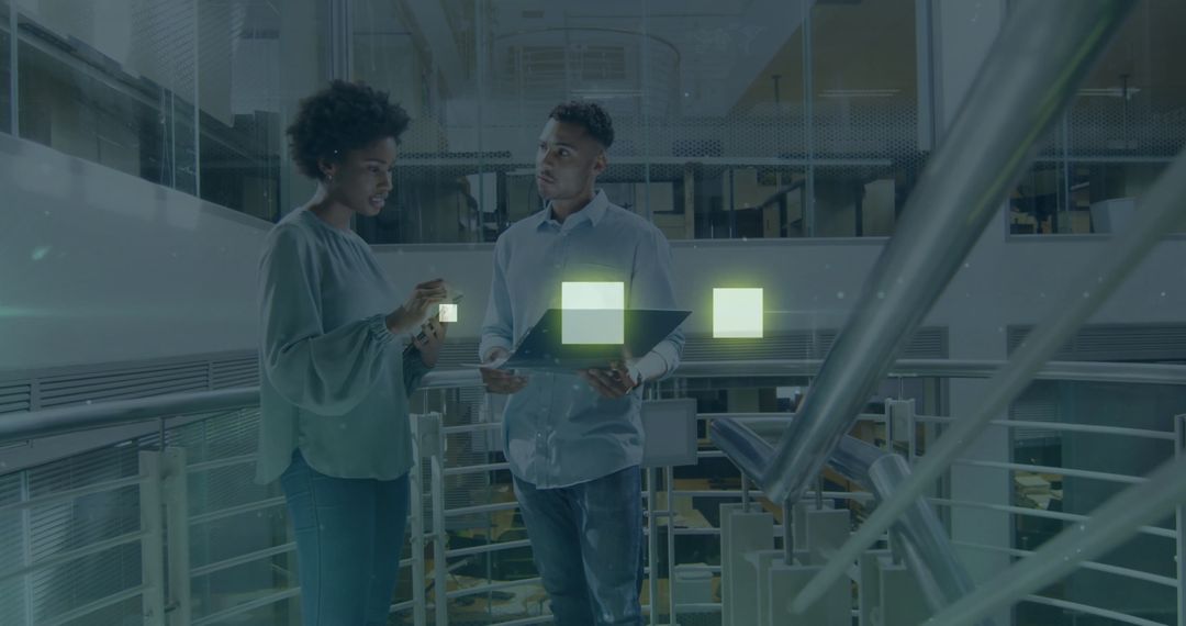 Business Professionals Discussing Digital Data with Futuristic Interface