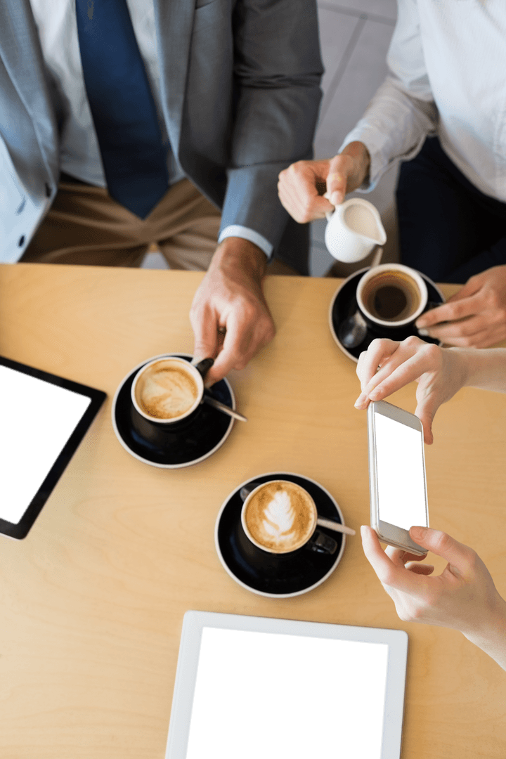 Transparent Coffee Business Meeting with Digital Devices High Angle