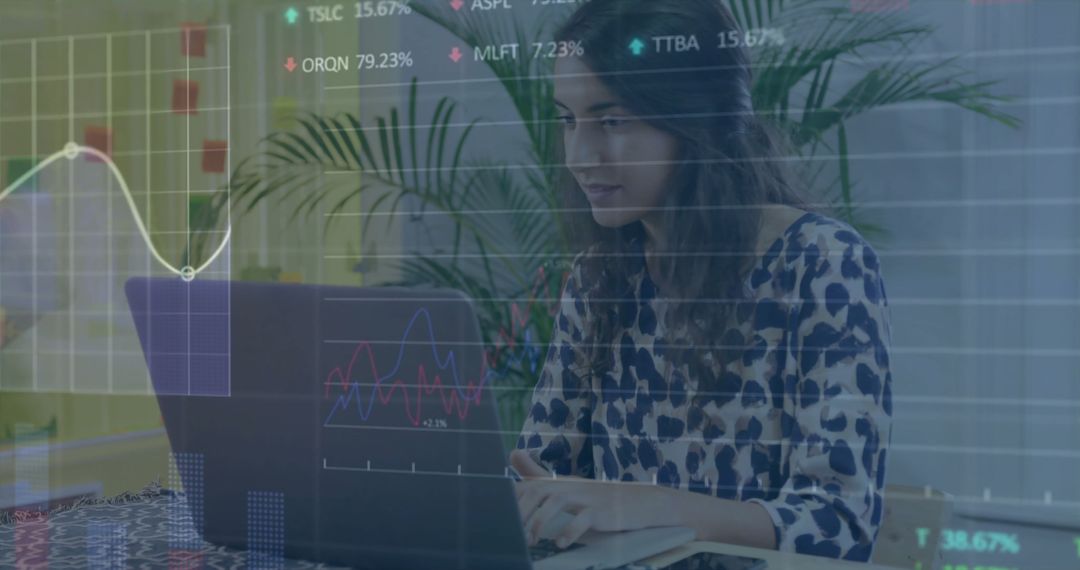 Financial Analyst Using Laptop Analyzing Global Market Data