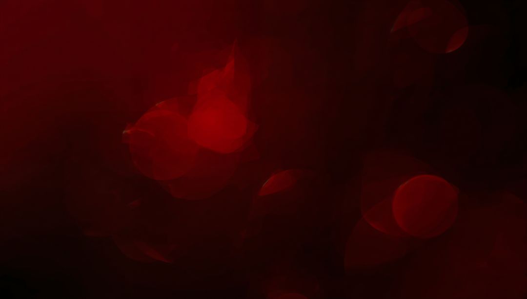 Moody Red Bokeh Abstract with Soft Light Flares and Translucent Crimson Halos