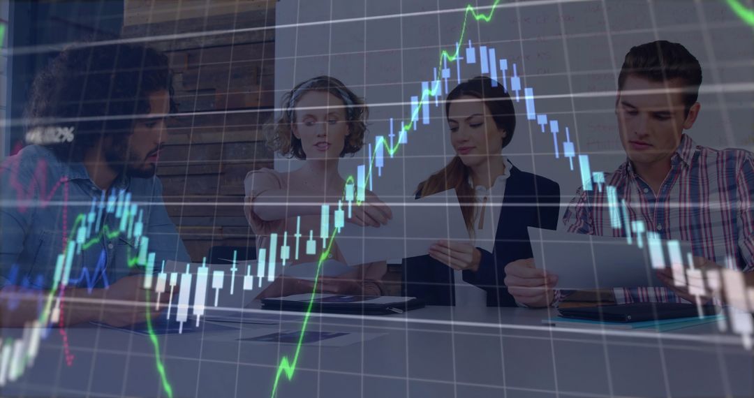 Team Analyzing Financial Graphs in Modern Office Setting