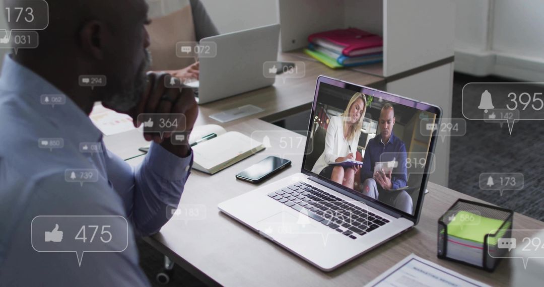 Focused Professional Amidst Virtual Meeting and Technology Notifications