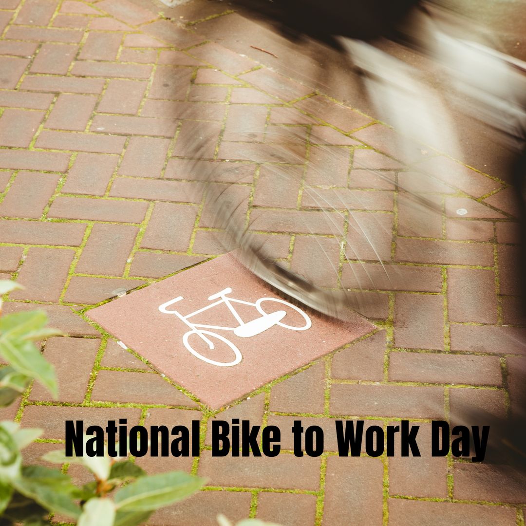 Cyclist Riding Past Bike Symbol on National Bike to Work Day