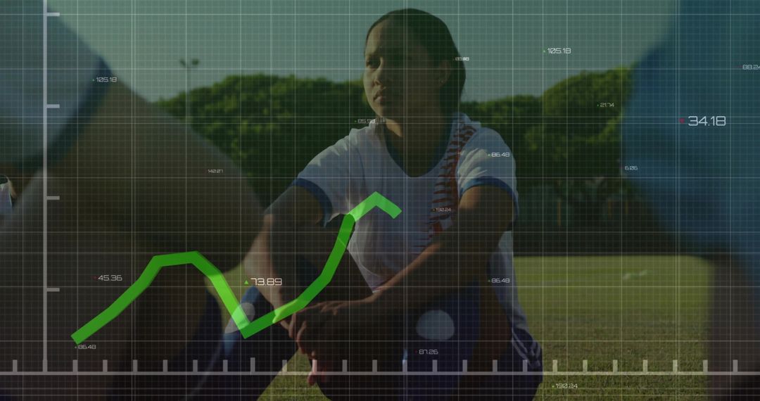Focused Female Soccer Player With Superimposed Financial Data
