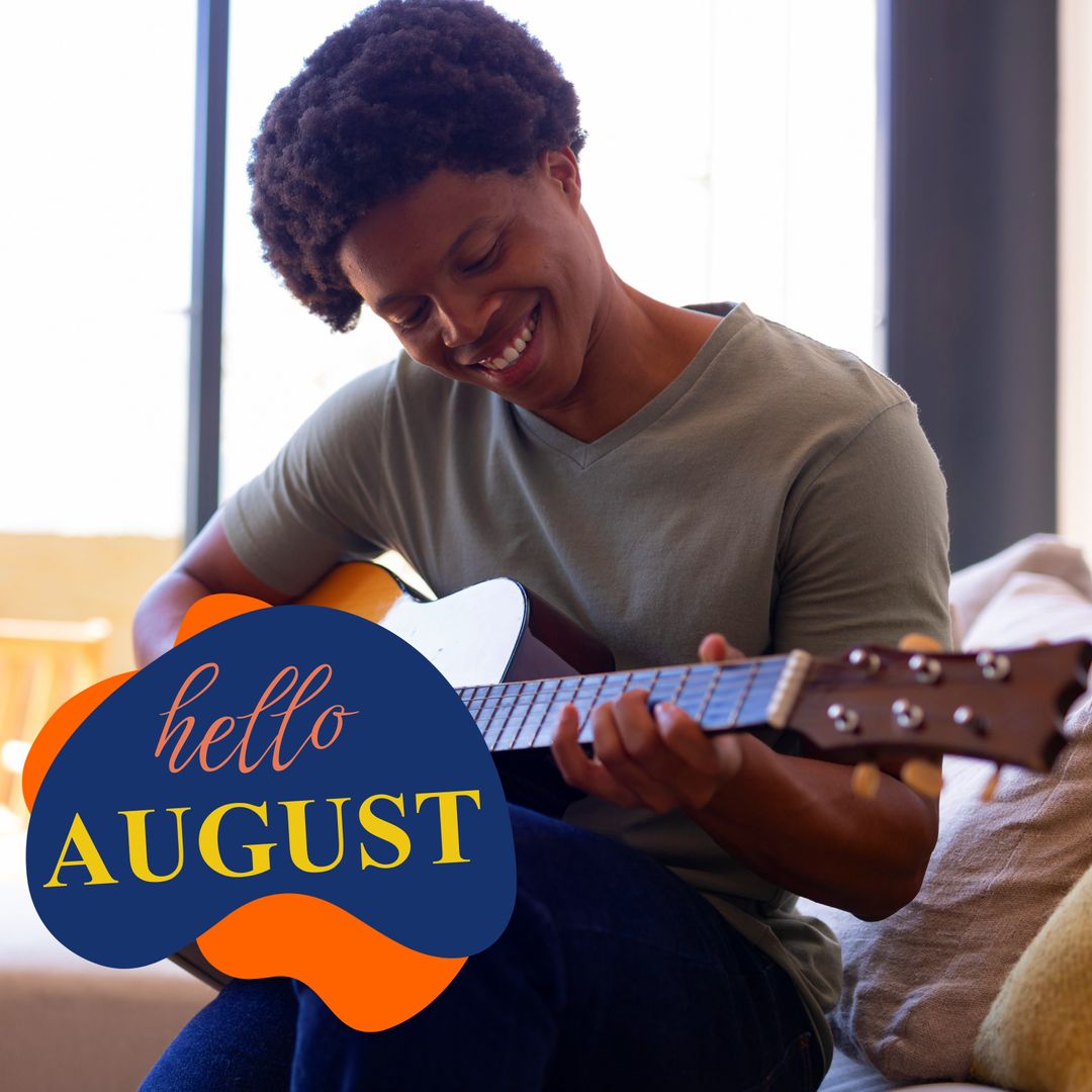 Optimistic Young Man Playing Guitar with August Vibes
