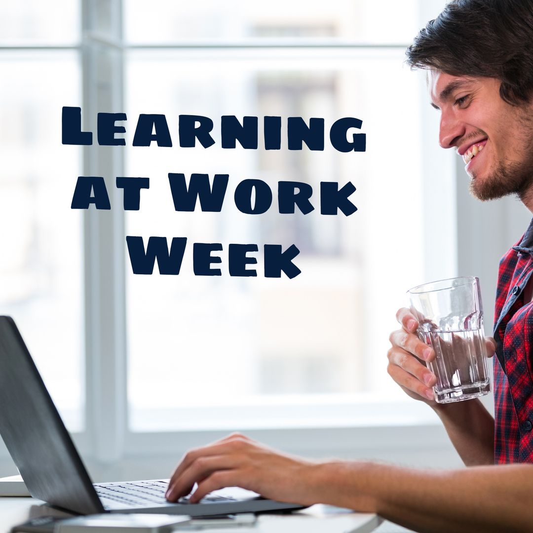 Smiling Young Professional Engaged in Remote Work