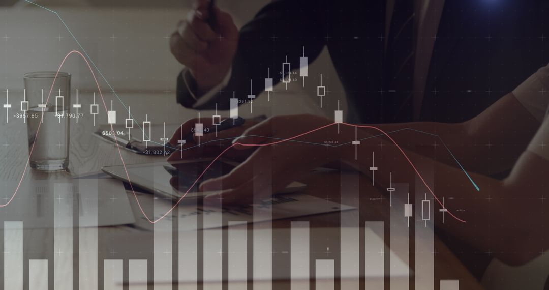 Business Team Analyzing Financial Graphs on Digital Tablet
