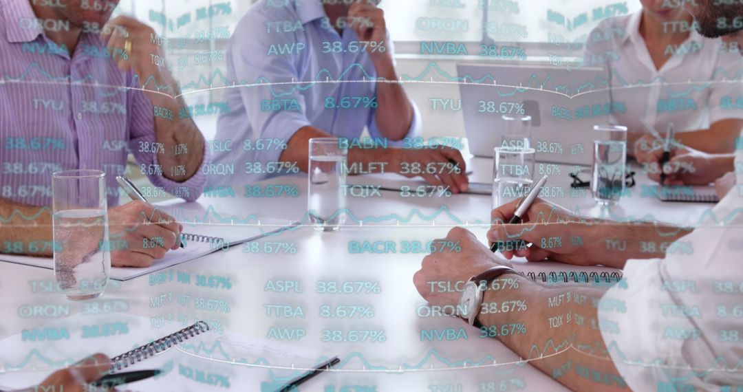 Collaborative Business Strategy Meeting with Financial Data Display