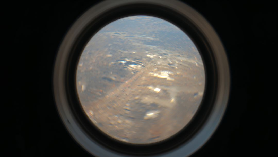 Circular Cabin Porthole Revealing Hazy Sunlit Runway Over Distant Desert Terrain Through Glare