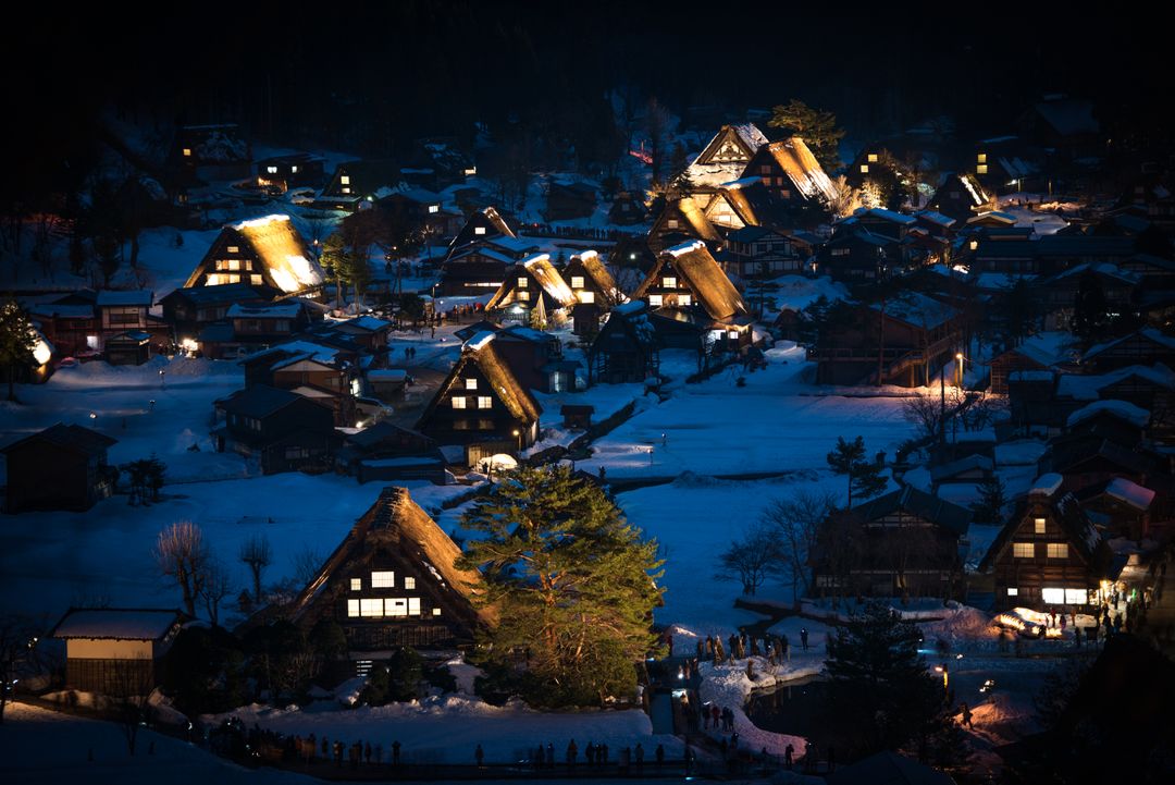 Traditional Japanese Village Illuminated at Night During Winter - Free Images, Stock Photos and Pictures on Pikwizard.com