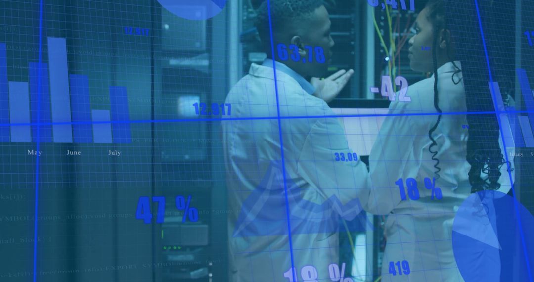 Server Room Technicians Analyzing Data on Digital Display