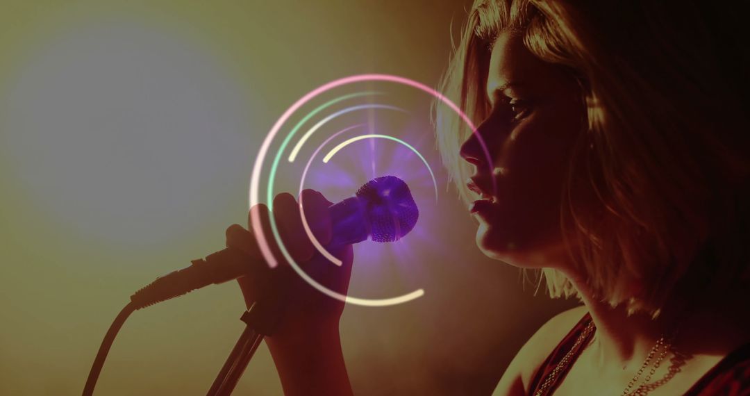 Female Singer Performing with Dynamic Lighting on Stage