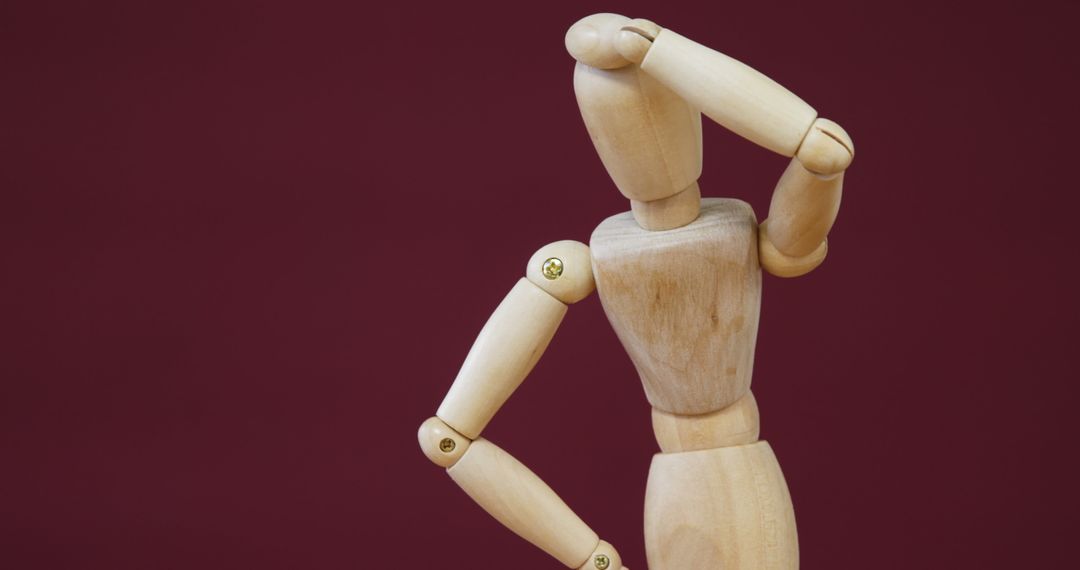 Wooden Mannequin Deep in Thought Concept