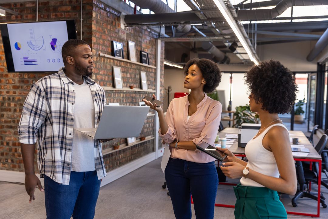 Collaborative Meeting in Modern Office with Technology