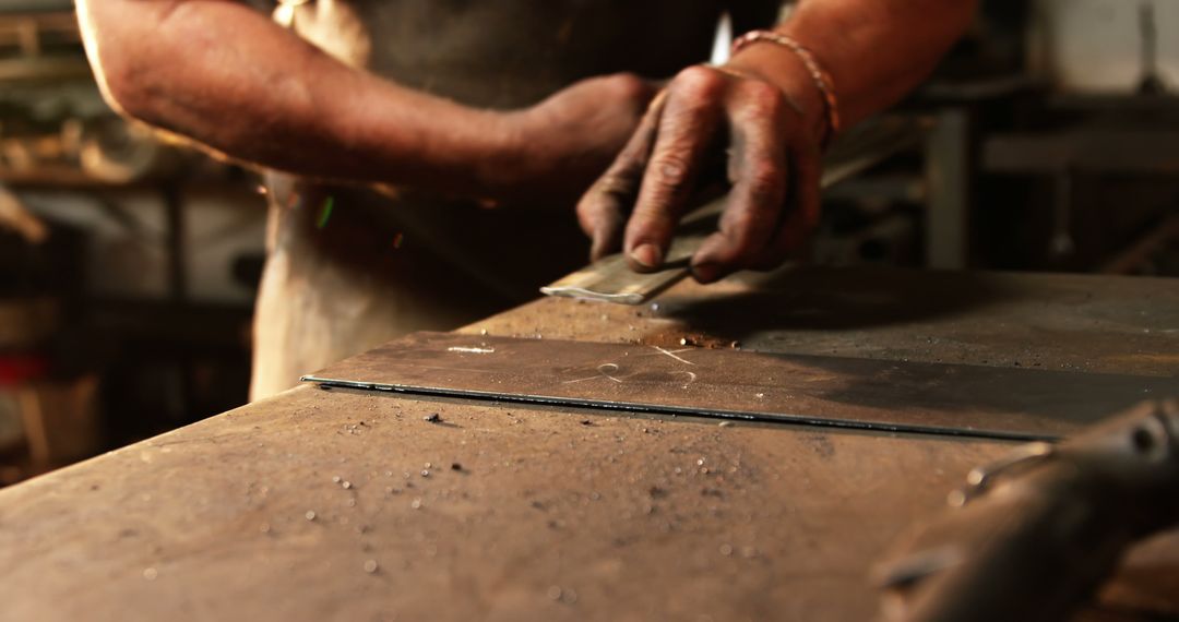 Skilled Craftsman Working in Metal Workshop - Free Images, Stock Photos and Pictures on Pikwizard.com