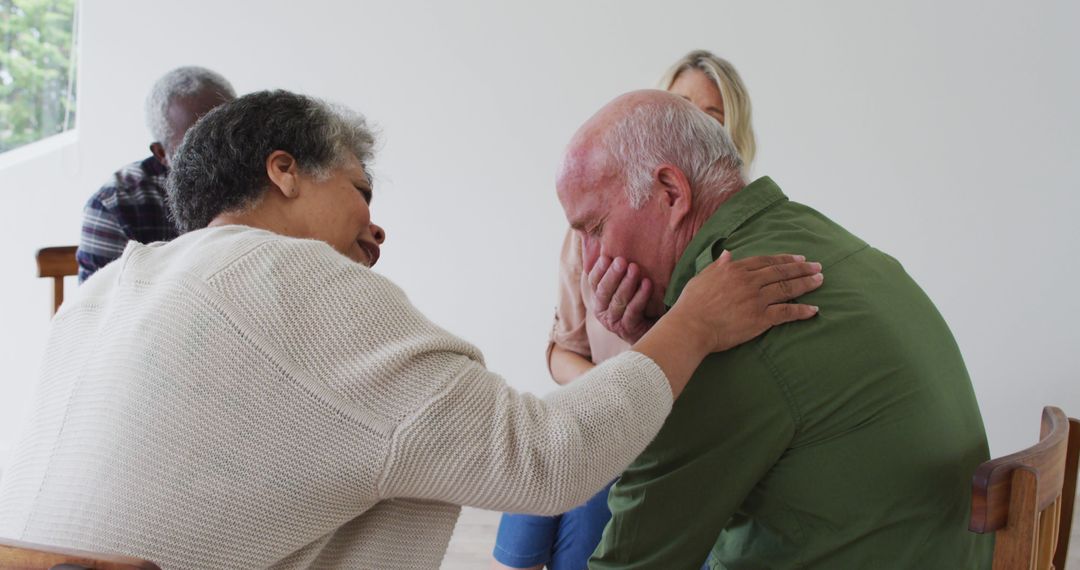 Support Group Comforting Emotionally Distraught Senior Man - Free Images, Stock Photos and Pictures on Pikwizard.com