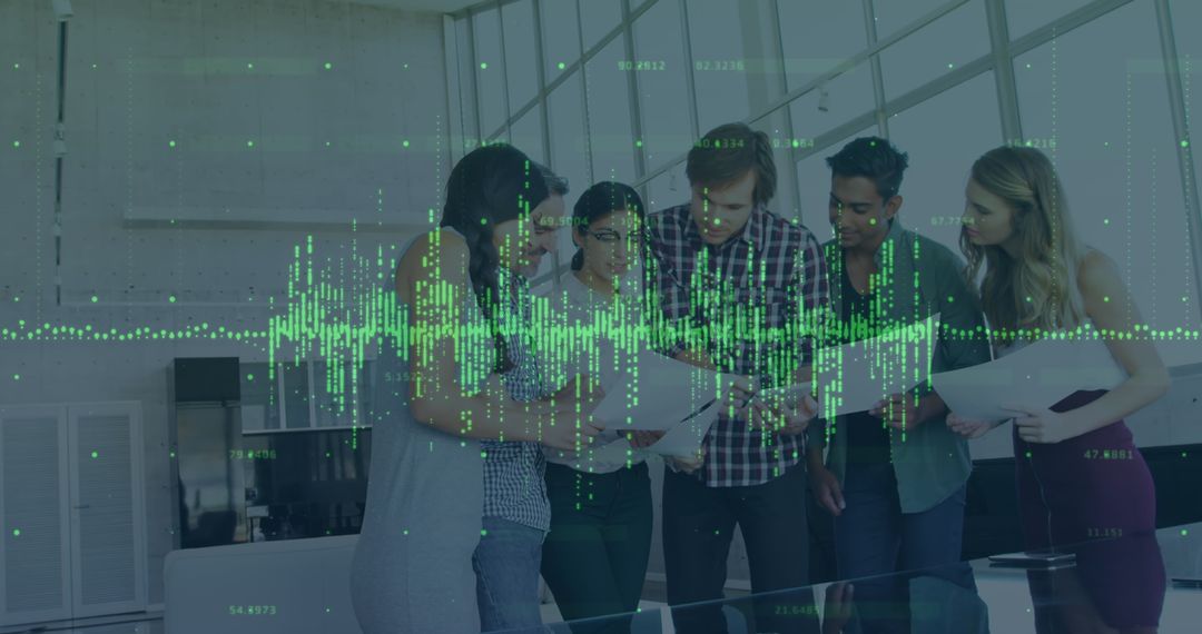 Team Analyzing Financial Data Through Digital Interface in Office