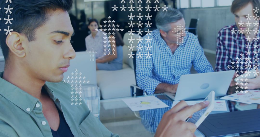 Team Collaborating on Digital Innovation in Modern Office