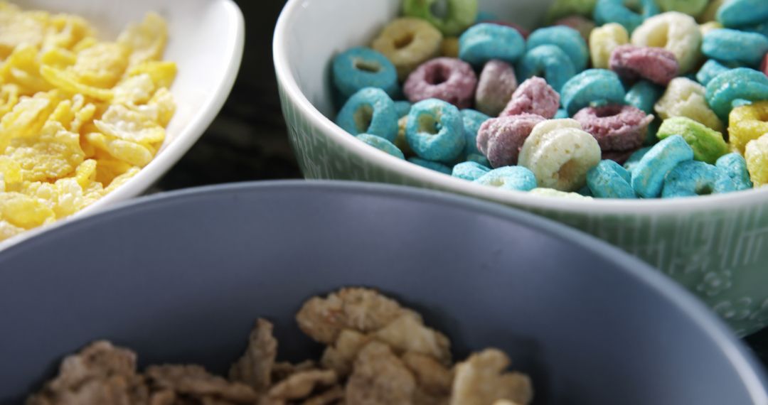 Assorted Colorful Cereals in Bowls for Breakfast - Free Images, Stock Photos and Pictures on Pikwizard.com