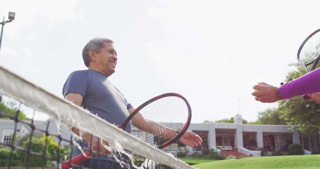 Senior Man Playing Tennis Outdoors Having Fun - Free Images, Stock Photos and Pictures on Pikwizard.com