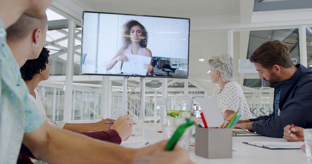 Modern Office Video Conference with Diverse Team Collaboration