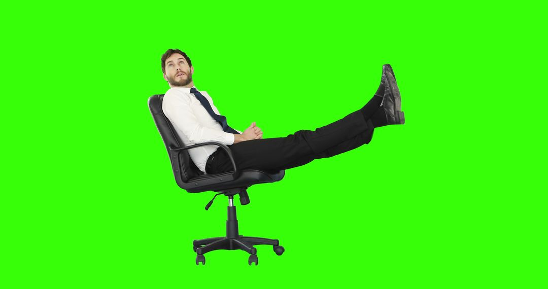 Man Relaxing in Office Chair on Green Screen Background - Free Images, Stock Photos and Pictures on Pikwizard.com