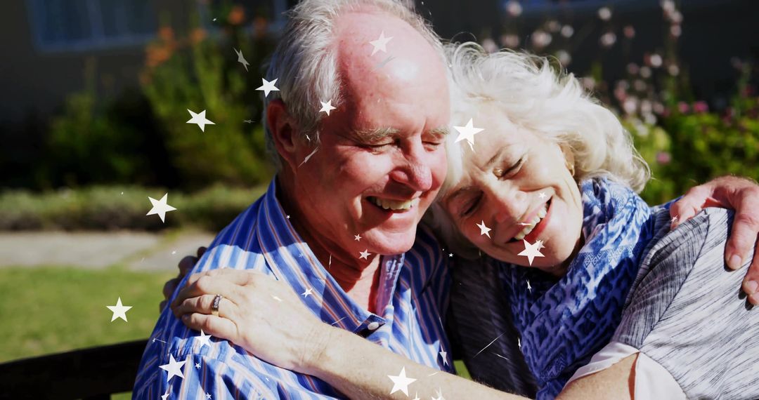 Senior Couple Embracing Joyfully on Garden Bench